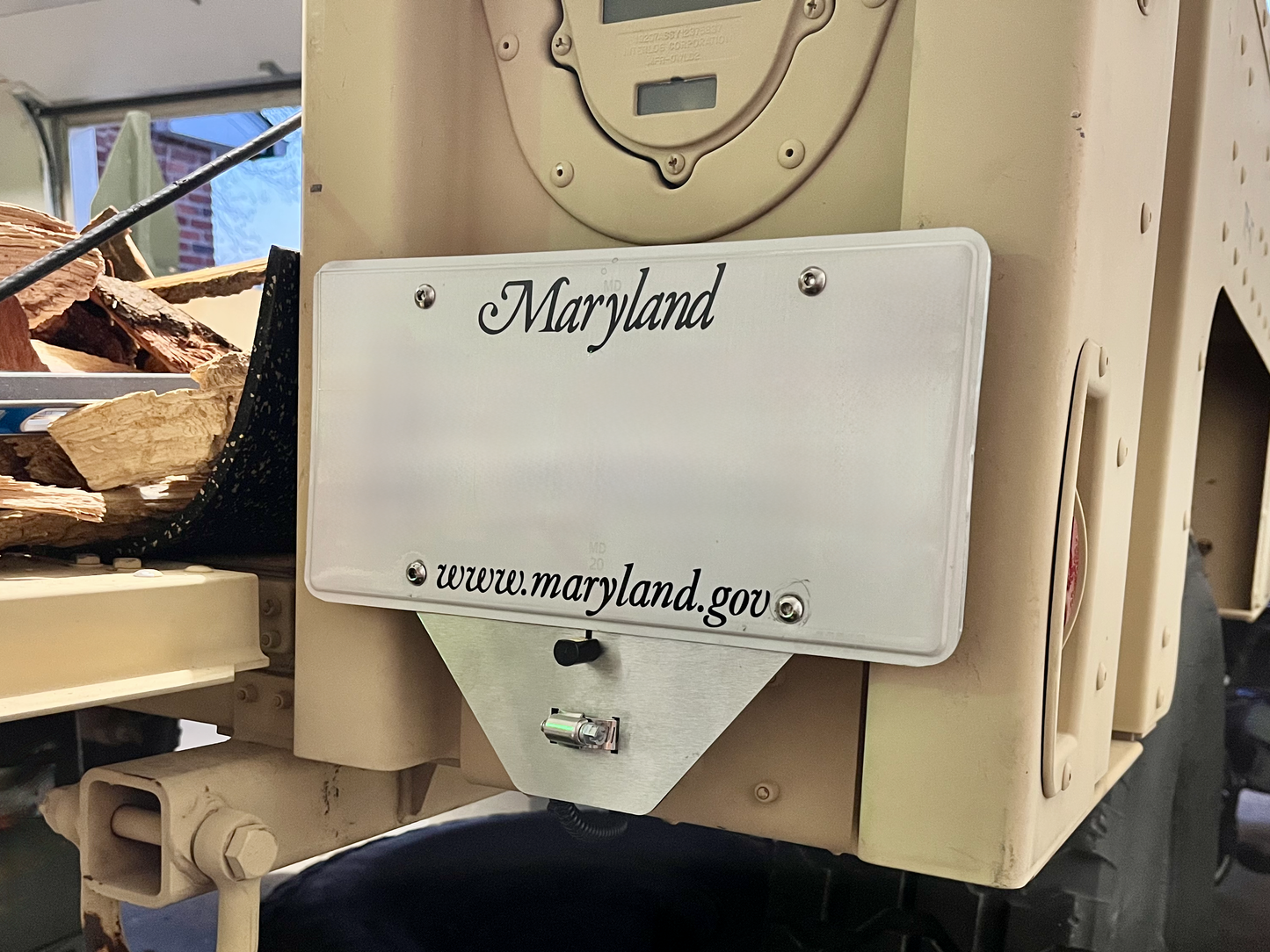 RL M1101 License Bracket - Installed with optional LED light and with example license plate