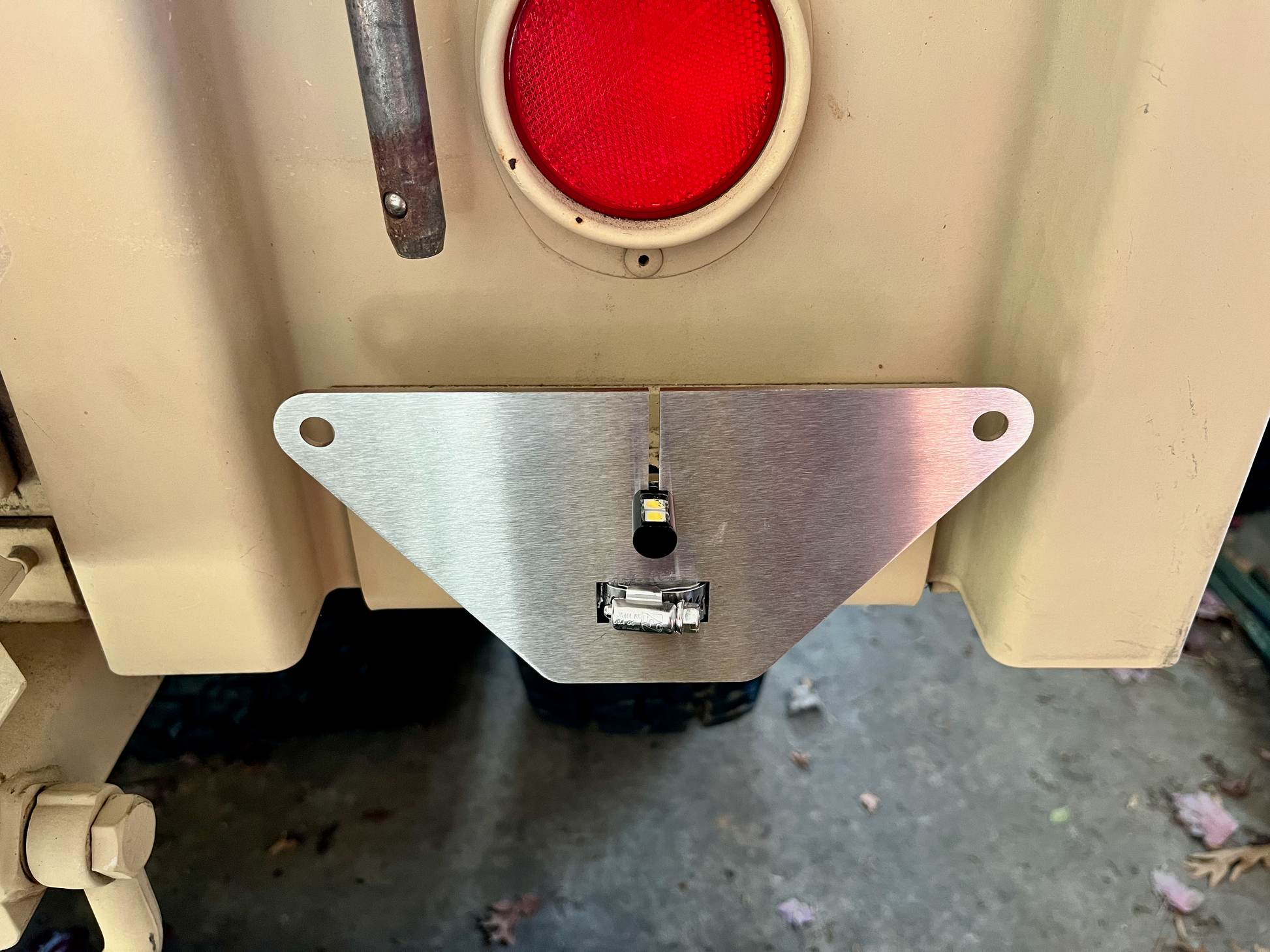 RL M1101 License Bracket - Installed with optional LED light and without license plate 